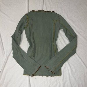 Green long sleeve with lettuce detailing
